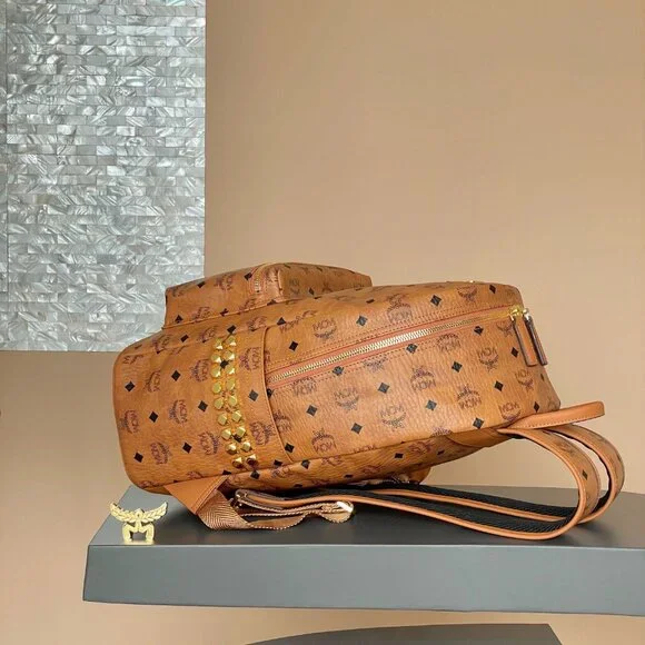 MCM Tan Leather Backpack/purse with Gold Accents - Picture 2 of 9